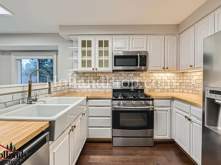 10250 NW Village Heights Dr — Photo 12