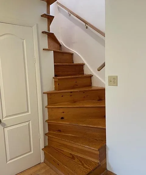 Staircase to lofted bedroom