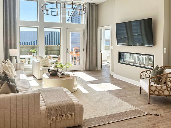 Sunlit Gathering Room Opening to the Rear Patio