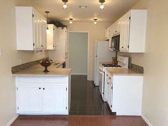 Stainless sink, gas stove, microwave, dishwasher and refrige