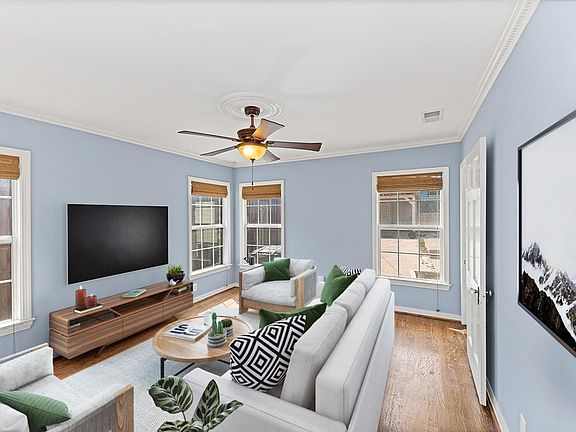 This image shows a virtually furnished space. This space come unfurnished.