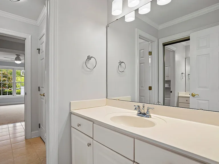 Jack and Jill bathroom with separate sinks for each room