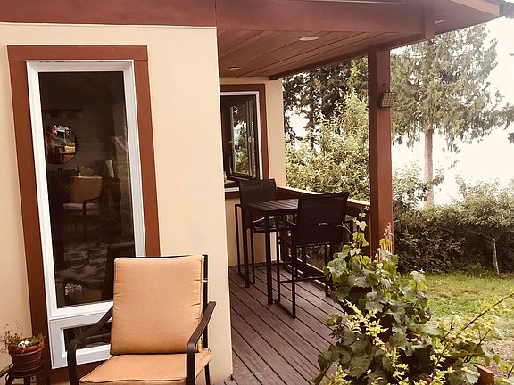 covered deck overlooking water