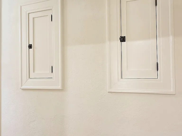 Convenient built-in storage cabinets in the hallway