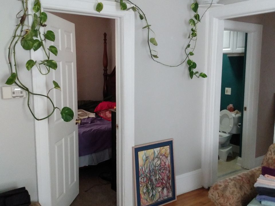 Living Room and doorway to smallest bedroom and doorway to bathroom.