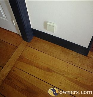 Wide hard pine floors, central vacuum vents to outdoors.