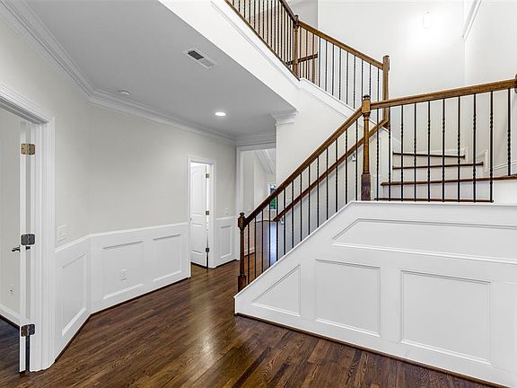 Grand two-story foyer at front door entrance