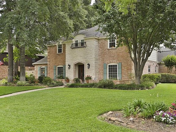 An additional view of the side yard of the home.