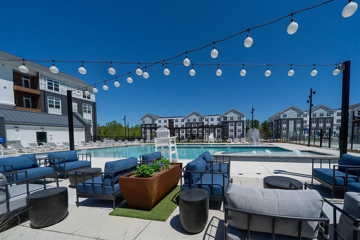 Saltwater Swimming Pool with Outdoor Seating - James Run Apartments
