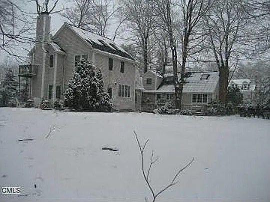 Back yard showing both houses that share the yard