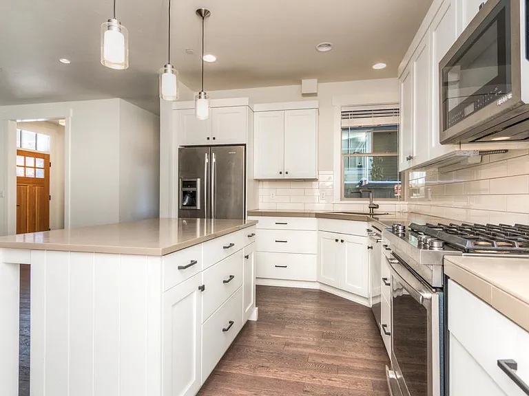 Kitchen with gas range and oven