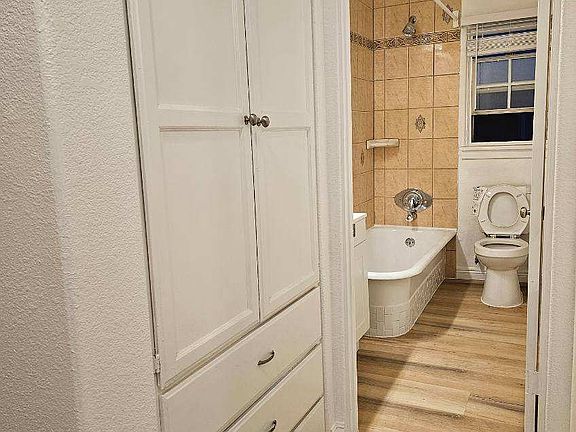 Lots of linen cabinet space! Deep sink-in bathtub, automatic light shut on n off recess lights and vanity fixture