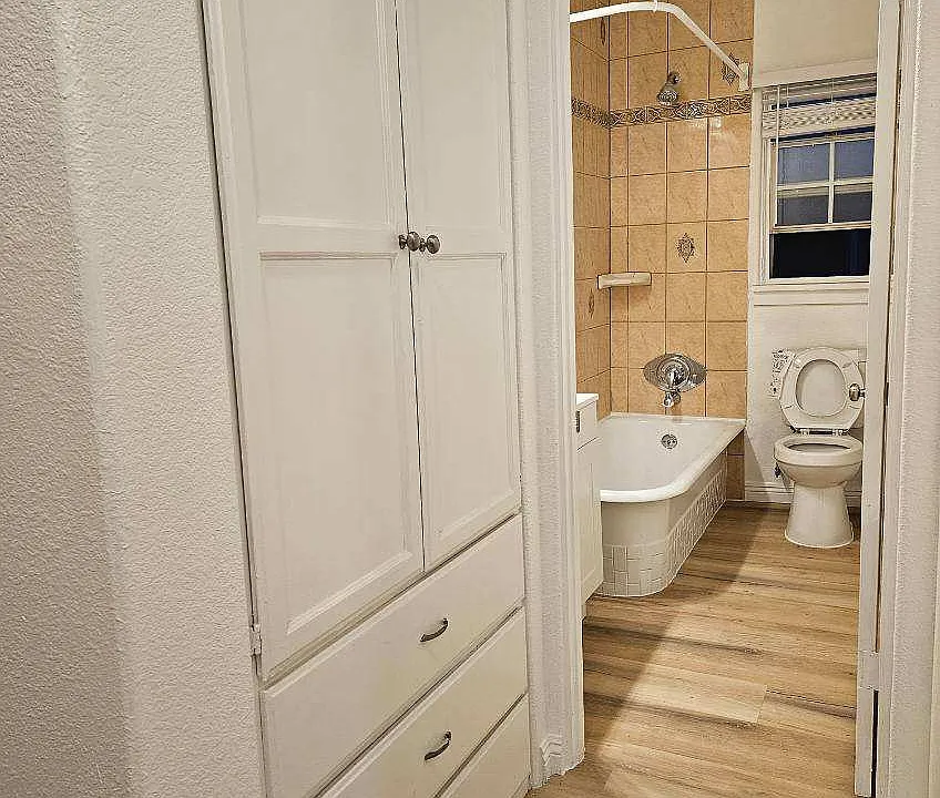 Lots of linen cabinet space! Deep sink-in bathtub, automatic light shut on n off recess lights and vanity fixture