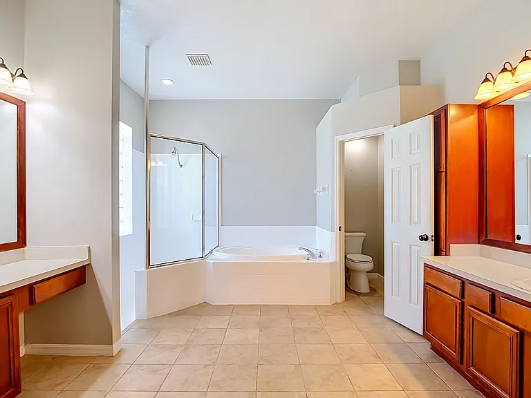 Primary bathroom. Shower and tub with separate water closet.