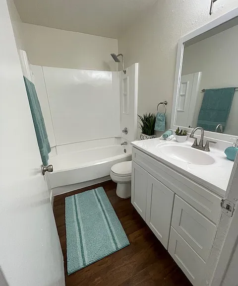 Spacious bathroom with modern fixtures.