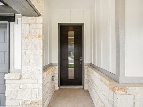 Front exterior of the Oleander floorplan at a Meritage Homes community.