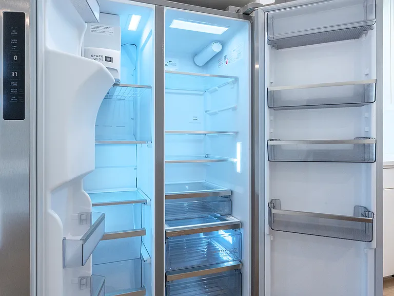 Large capacity refrigerator with water and ice maker