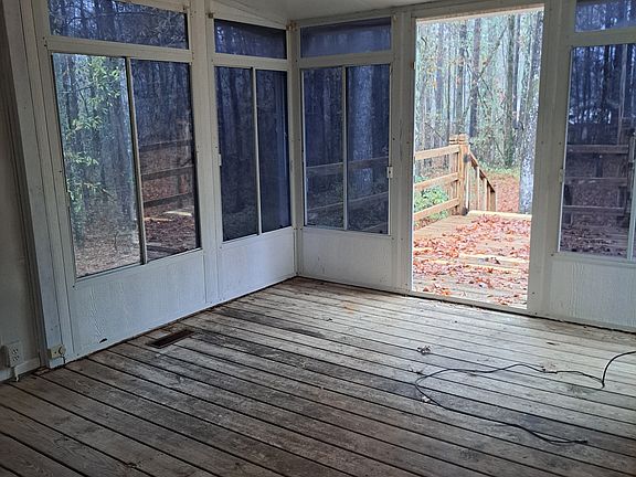 covered back porch/ sunroom