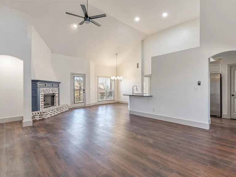 Living Room - Eat-In Kitchen - Fireplace and Hallway