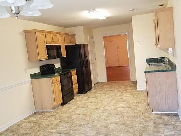 Large Kitchen with room for a large kitchen table!  Brand Ne