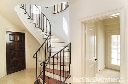 Entrance
						:
						Main staircase and access to dowstairs bedroom also access Garage and elevator.