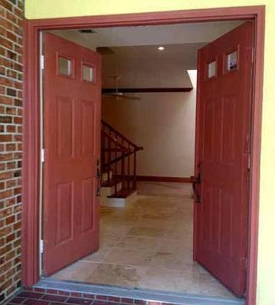 Doors open to foyer