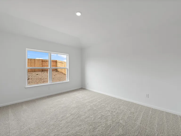 Master bedroom features a walk-in closet and its own bathroom.