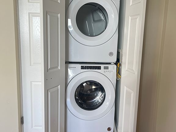 NEW front loading washer & dryer IN UNIT.