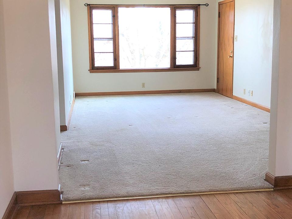 Sunny, charming living space with fresh carpet and large, lit closet. Windows open for cross breeze!