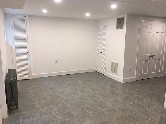 View from dining area towards living room area.  Front door 