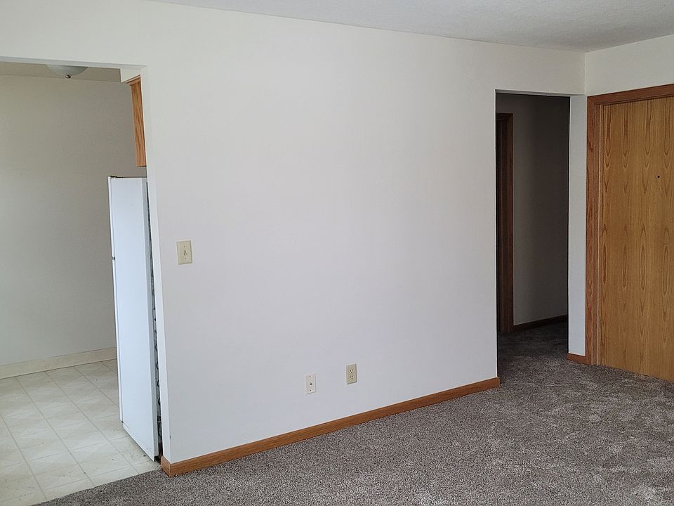 Living room; view towards entry and hallway (leads to 2 bedrooms and 1 bathroom).