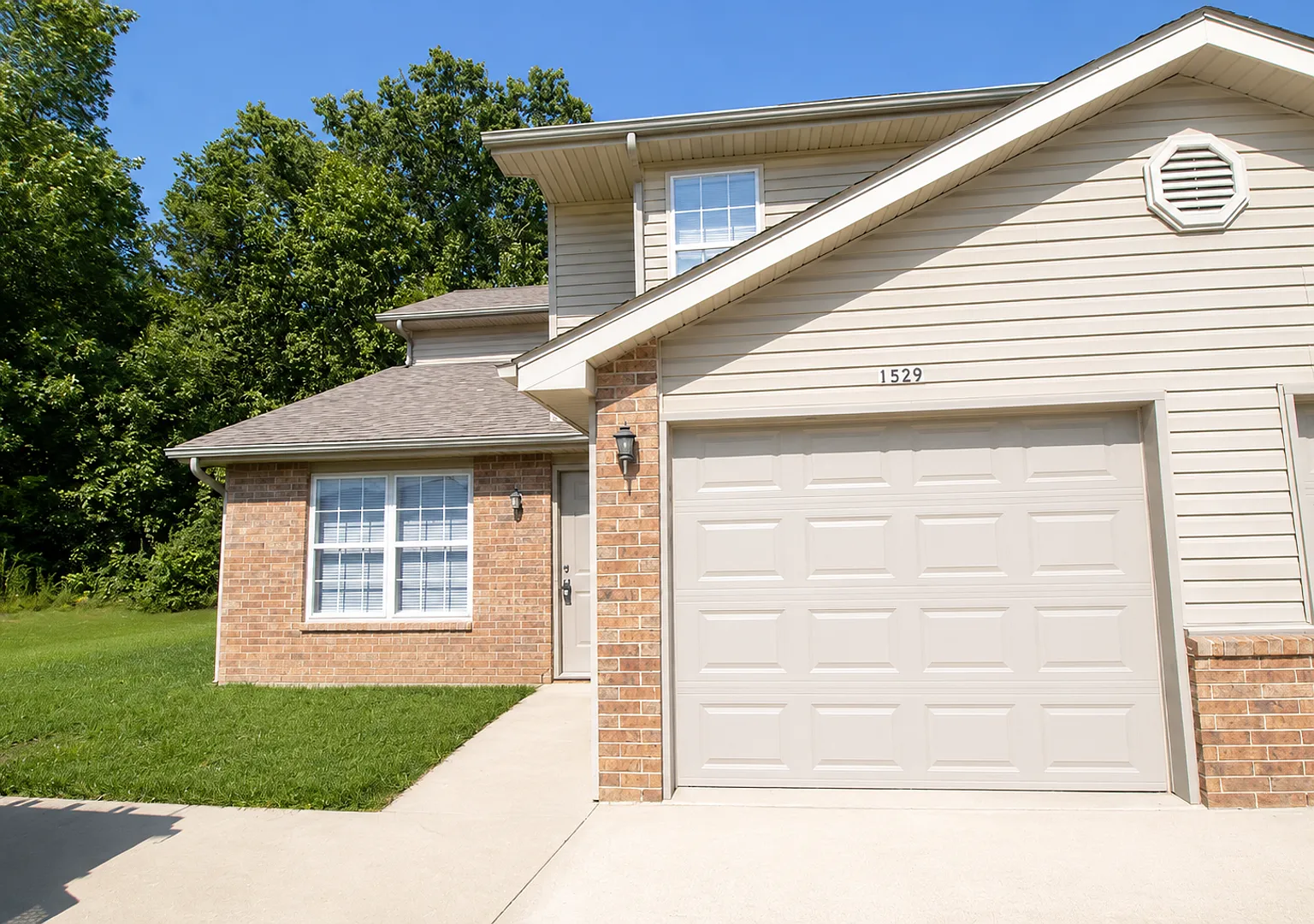 Four Bedroom, Three Bathroom Duplex with Attached Garage — Photo 1