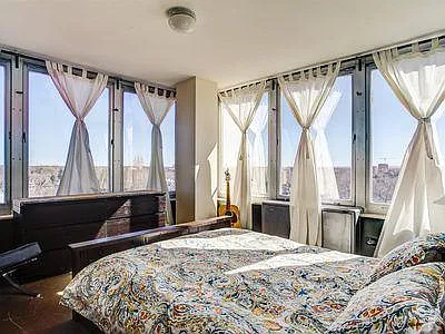 Second bedroom with east and south facing windows.