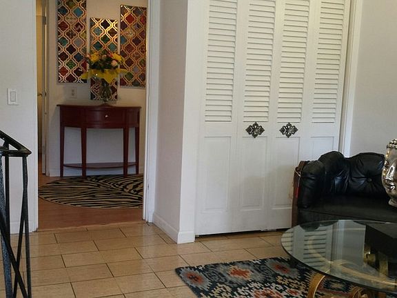 Entry Leads To Family Room & Powder Bath