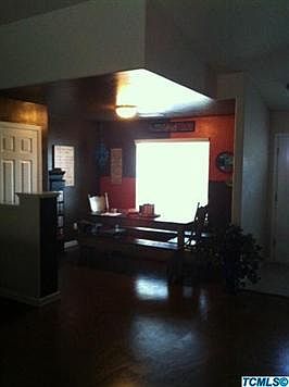 3rd bedroom option has walls removed and is being used as a Formal Dining Room.
