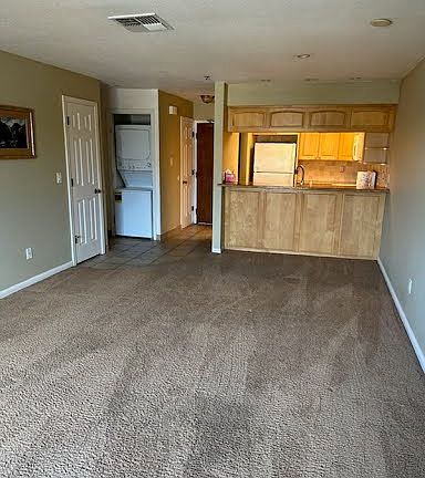 Entrance from Hallway leads to kitchen and to living room.