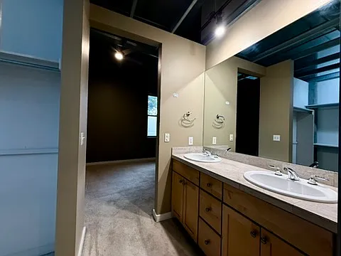 Primary bath, double vanity, and lots of storage