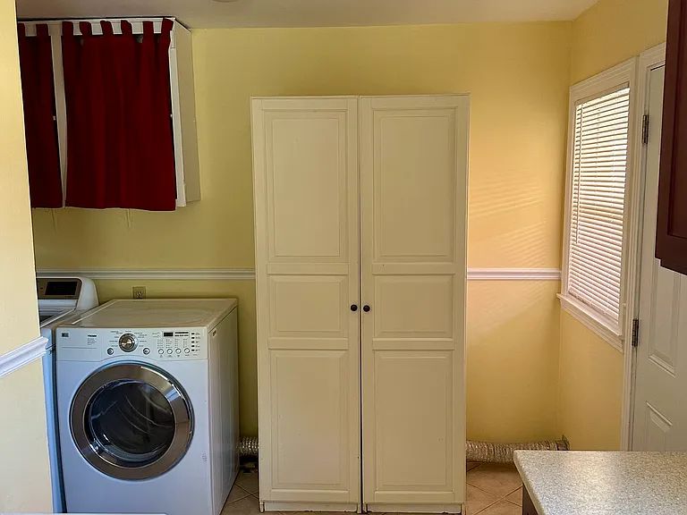 Storage + washer dryer.