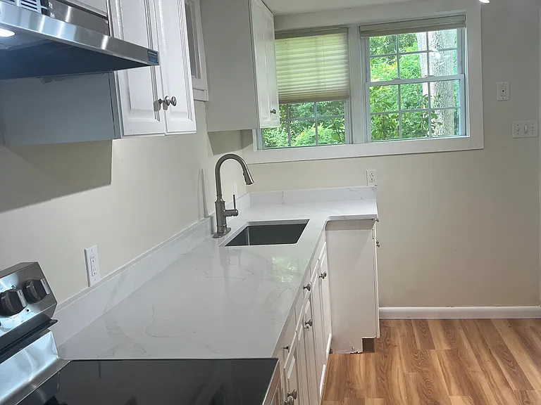 View of kitchen from bathroom