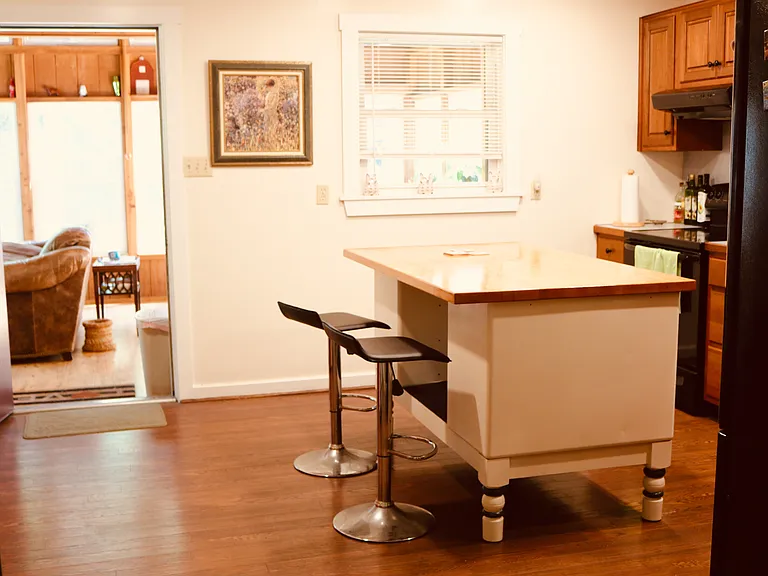 Kitchen looking out to the sunroom