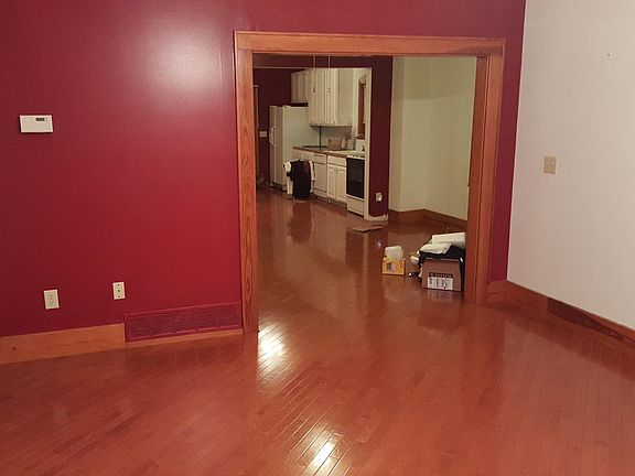 Living room looking into dining room and kitchen.