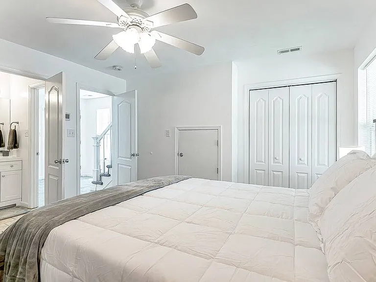 First floor bedroom with entrance to hall bathroom.