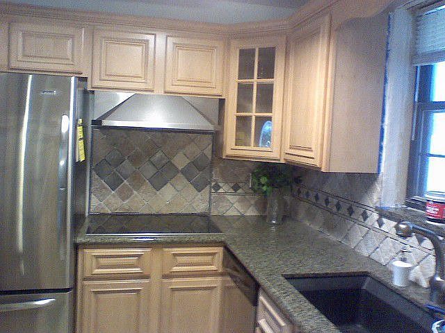 Flat top Oven, Stainless Steel Refrigerator, new Maple cabinets