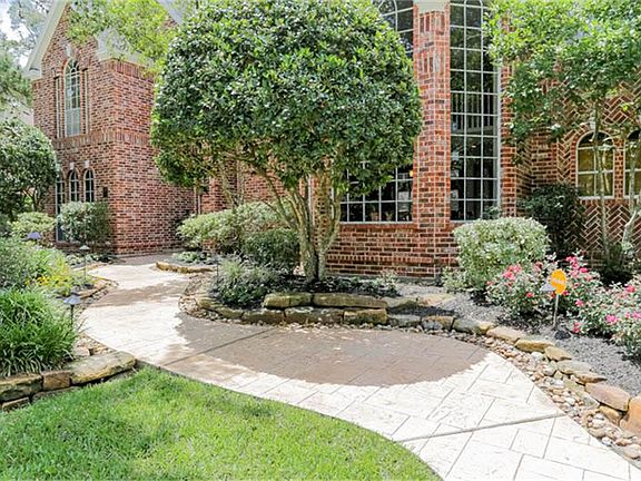 The updated walkway and front porch provide a welcoming entrance to this charming home. Outside ligh