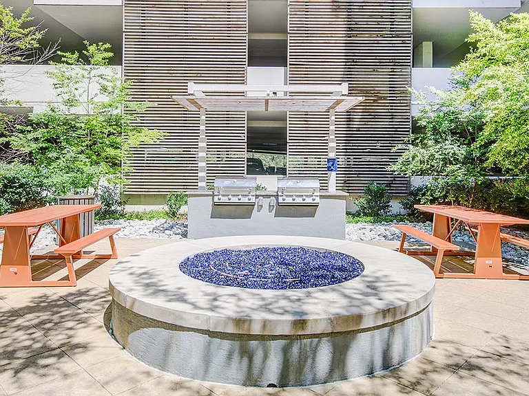 Griffis Uptown outdoor courtyard with fire pit.