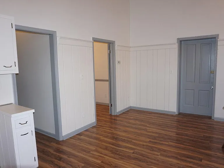 Hallway on left, bedroom on right
