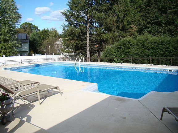 Large new Pool w/ extensive concrete and paver work