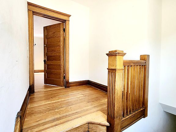 Landing outside of main unit entryway has space for bench/coatrack/catch-all table.
