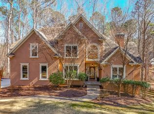 718 Whisper Wind Ct, Woodstock, GA 30189