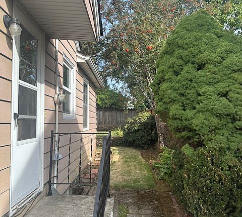 Side door access to kitchen.